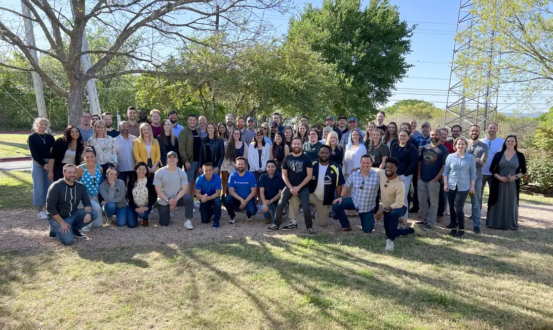 The Living Security team gathered outdoors