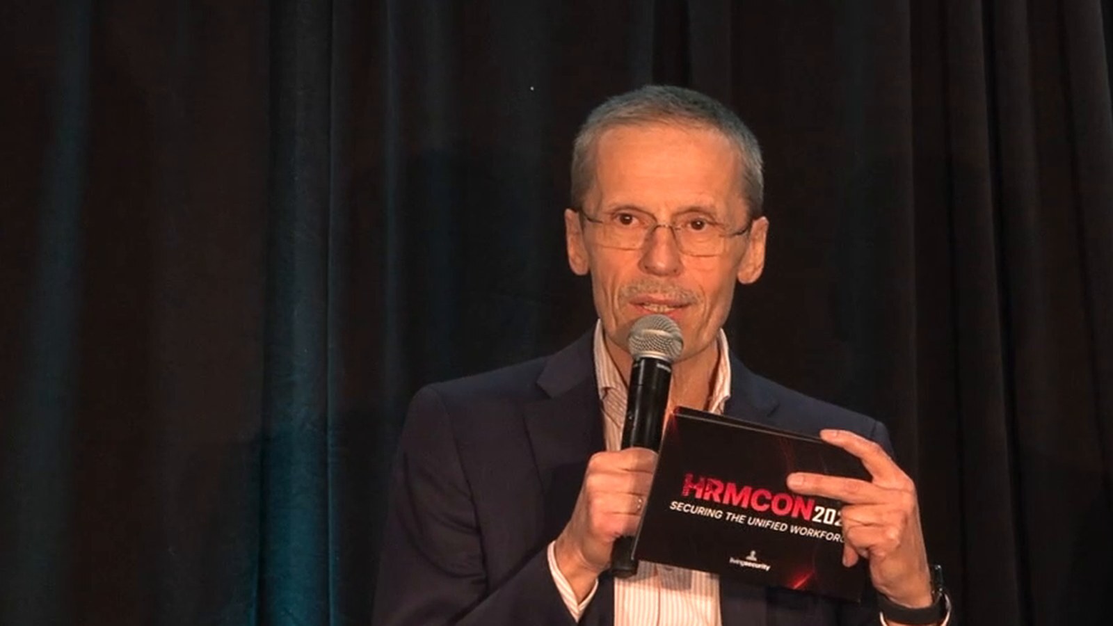 Genady Vishnevetsky speaking at HRMCon 2026